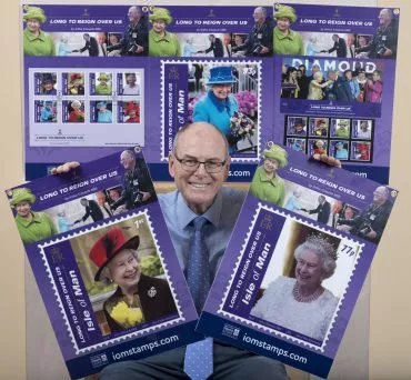 Sun Photographer Arthur Edwards MBE with blow-up pictures of Isle of man postage stamps with Arthur portraits of the Queen Thees stamps are to celebrate the Queens 90th birthday in April 2106 Picture: Paul Edwards The Sun London