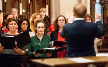 Staff get festive at The News Building Carol Service